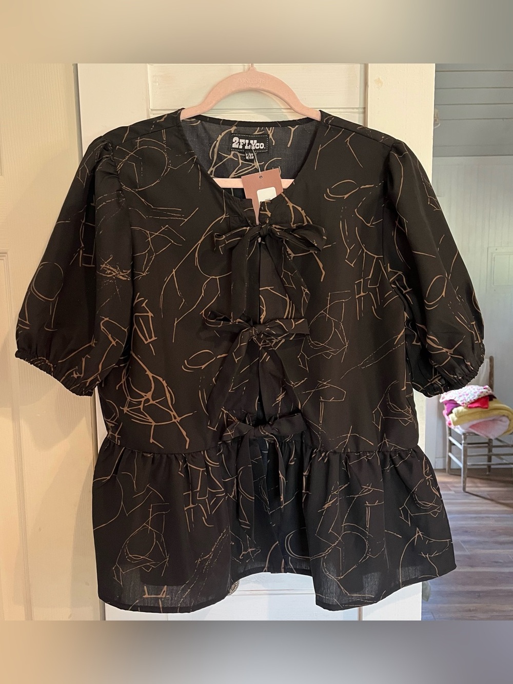 2Fly Co Black Puff Sleeve Tie-Front Peplum Top